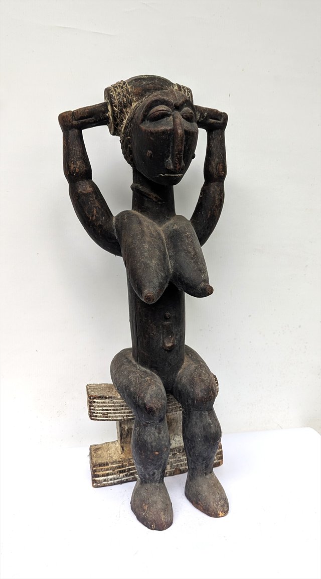 Attie Gwa Carved Wood Seated Female Figure, Cote d'Ivoire — view 1