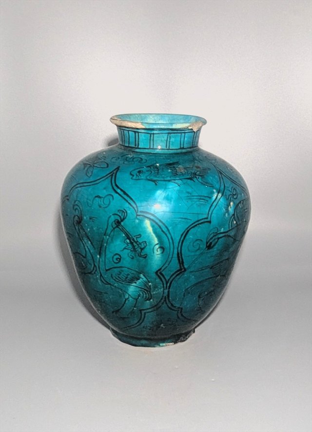 Qajar Persian Turquoise-Glazed Pottery Vase with Fish and Birds — view 1