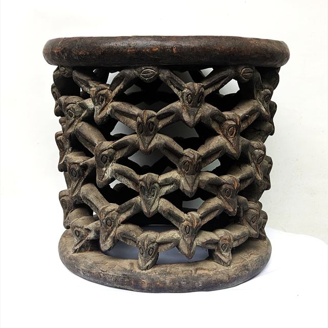 A carved openwork stool, photographed for the next ACA auction