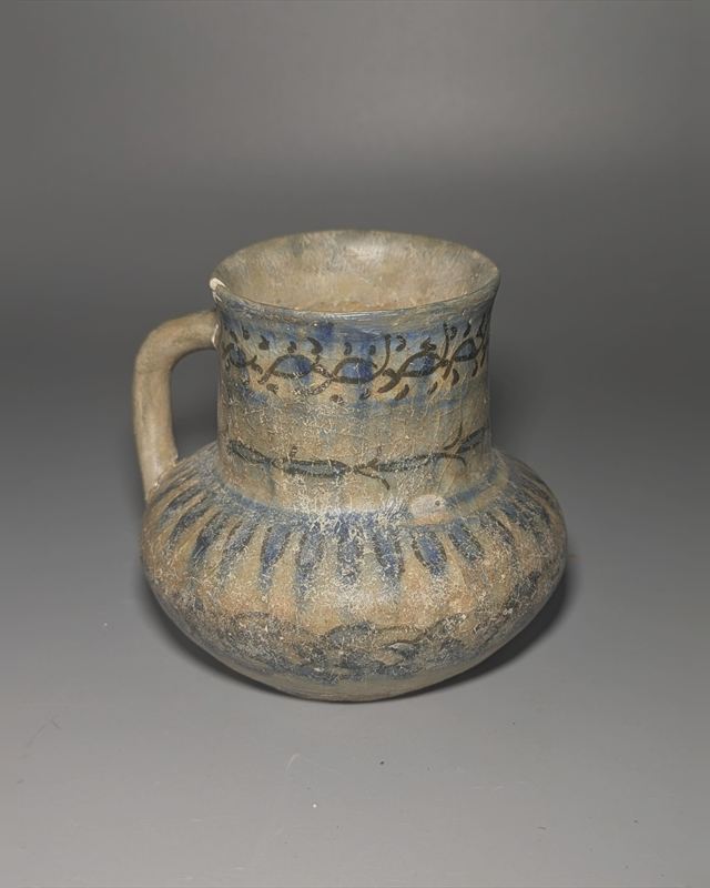 Persian Blue and Black Underglaze Fritware Jug, Probably Kashan, 13th Century — view 1 of 5
