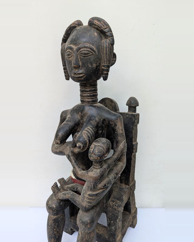 Baule Maternity Figure Seated on Chair, Cote d'Ivoire