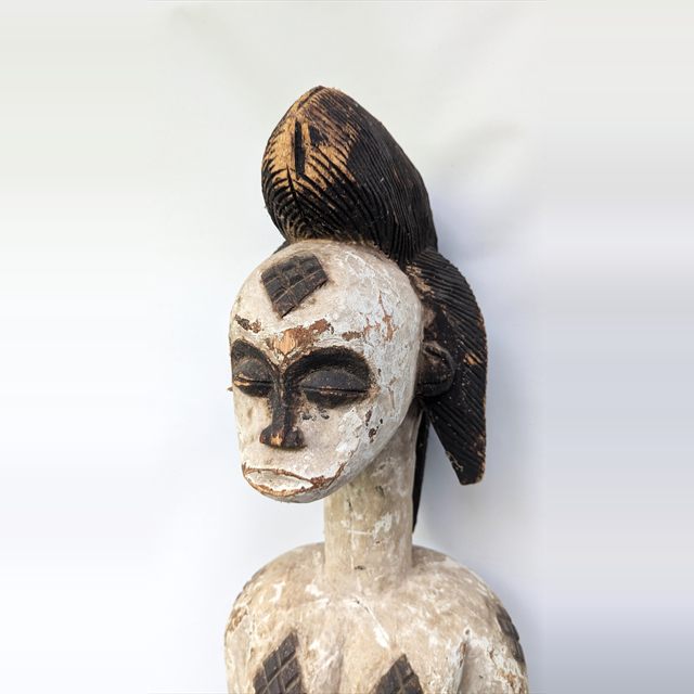 The head of a monumental Igbo Alusi shrine figure