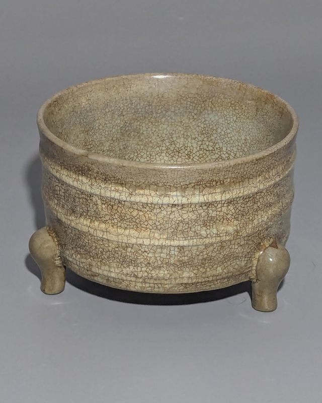 A Chinese Crackle-Glazed Tripod Censer